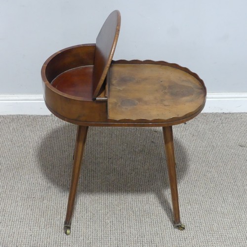 131 - A late 19th/early 20th century yew wood cutlery Table, with scalloped top and hinged compartment, ra... 