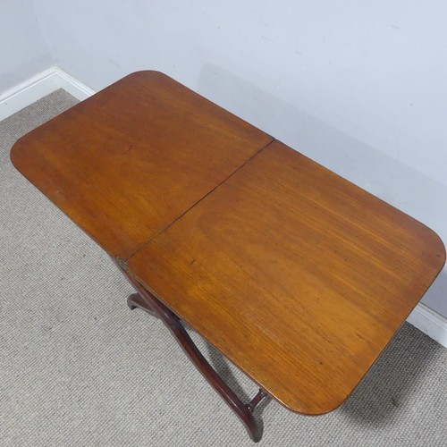 143 - A Victorian mahogany coaching Table, the folding ‘X’ shaped stand joined by turned stretchers, W 86 ... 