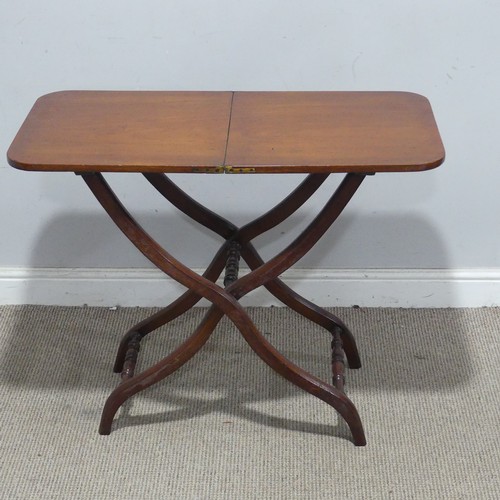 143 - A Victorian mahogany coaching Table, the folding ‘X’ shaped stand joined by turned stretchers, W 86 ... 