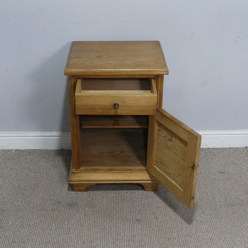 107 - An early 20th century stripped pine pot Cupboard, decorated with a carved eight-point star,  W 45 cm... 