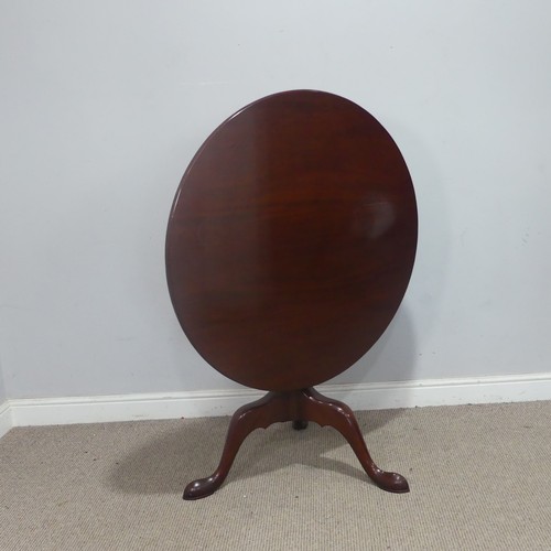 123 - A Georgian-style mahogany circular tilt-top Table, supplied by Harpers of Bath, raised on a triform ... 