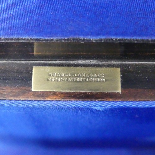 92 - A Victorian Howell. James & Co. brass bound domed-top coromandel stationary Box, applied with gi... 