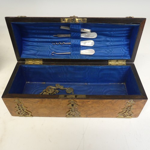 94 - A Victorian burr walnut gothic revival stationery Box, applied with a gilt metal foliate brass swing... 