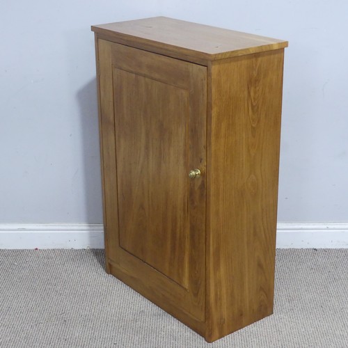 171 - A contemporary light oak side Cupboard, the rectangular top above a singular door, complete with thr... 