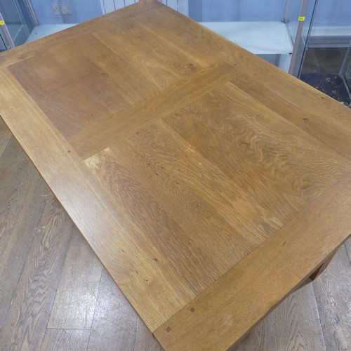 120 - A contemporary light oak kitchen Table, raised on squared supports, W 140 cm x H 76 cm x D 90 cm, to... 