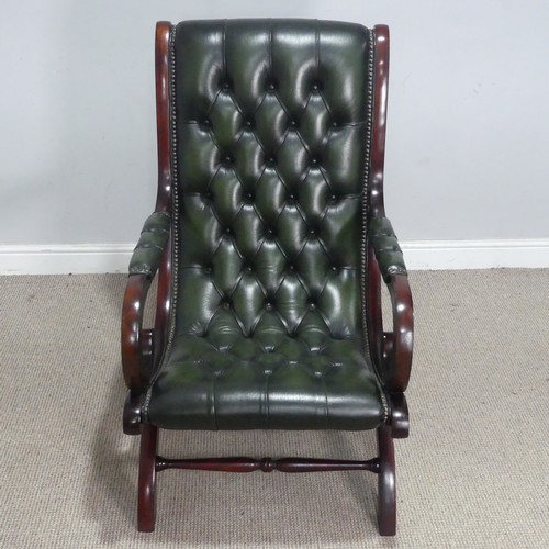 117 - A regency-style scroll mahogany nursing Chair, with button-back green leather upholstery, W 60 cm x ... 