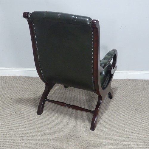 117 - A regency-style scroll mahogany nursing Chair, with button-back green leather upholstery, W 60 cm x ... 