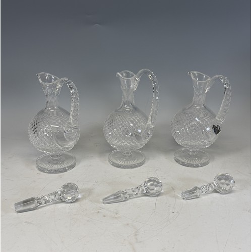 229 - Three Royal Doulton Crystal cut glass Decanters, with a variety of Stoppers, H 32 cm, together with ... 
