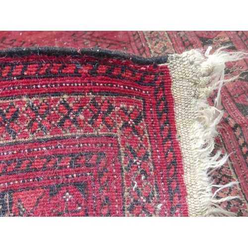 288 - Tribal Rugs; a red ground Belouchi Prayer Rug, 100% wool, 117cm x 79cm, together with a finely knott... 