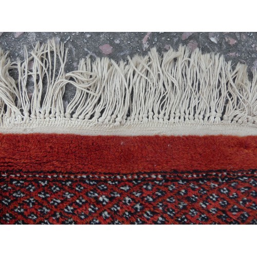 292 - Tribal Rugs; a large finely knotted Caucasian Bokhara design carpet, short wool pile on cotton base,... 