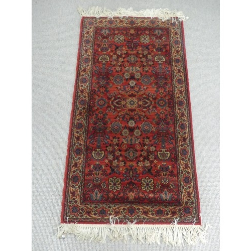 296 - A red ground Qashqai style machine-made 'Mossoul' rug, in good condition, 185cm x 85cm,... 