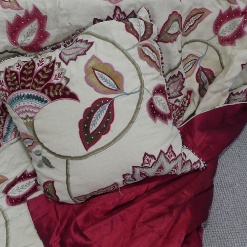281 - A large fabric Throw, appliqued and embroidered in bold floral designs, interlined and lined in red ... 