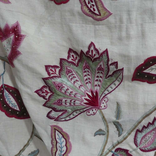 281 - A large fabric Throw, appliqued and embroidered in bold floral designs, interlined and lined in red ... 