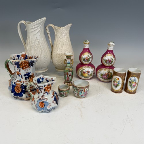 255 - A quantity of Dresden style Ceramics, together with a pair of Dudson Jugs, decorated in relief with ... 