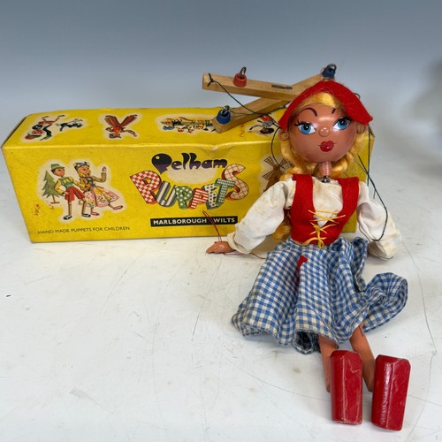 209 - A large quantity of Hummel Figures, one boxed 'Kiss me', the others engaging in recreational pursuit... 