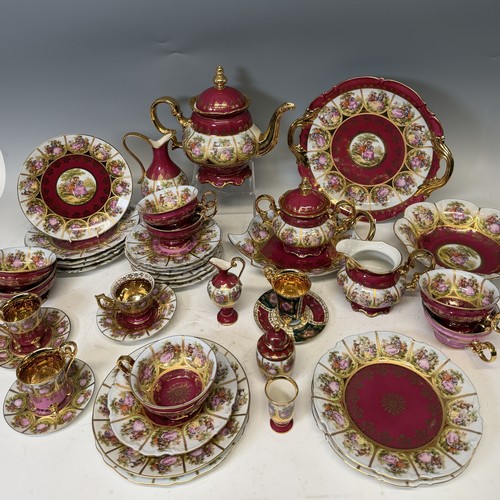 187 - A quantity Faronard-style burgundy red Vienna Porcelain, made by Josef Kuba, including part coffee a... 