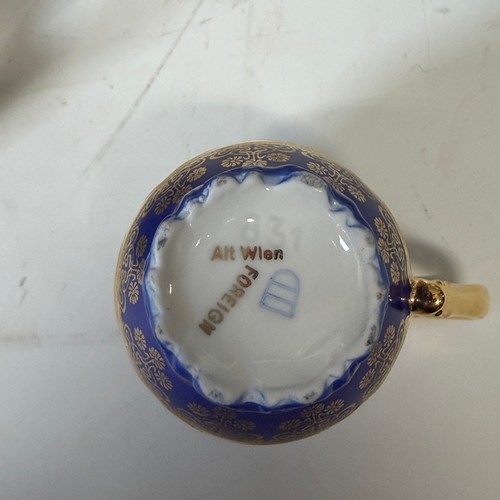 188 - A quantity Faronard-style cobalt blue Vienna Porcelain, made by Josef Kuba, including coffee service... 
