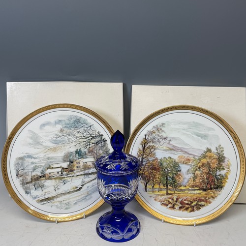 186 - A Bavarian blue flashed and cut glass Vase and Cover, of goblet form, H 27.5 cm, together with two d... 