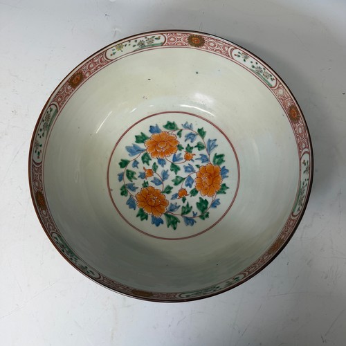 216 - A 19th century blue and gilt porcelain Bowl, decorated with floral motifs, H 13 cm x diameter 31.5 c... 