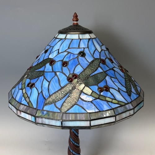 223 - An Art Deco style Tiffany & Co inspired stained glass Lamp, the shade and base decorated with dr... 