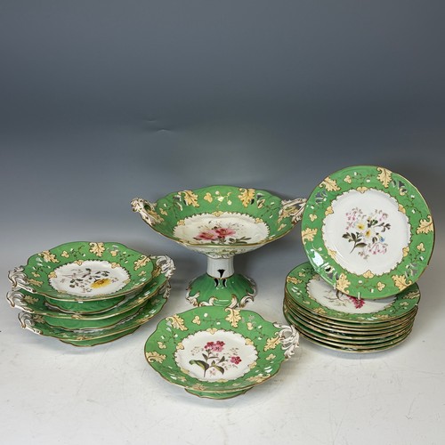 194 - A Staffordshire apple green dessert Service, with pierced, floral, and foliate decoration. (14)... 