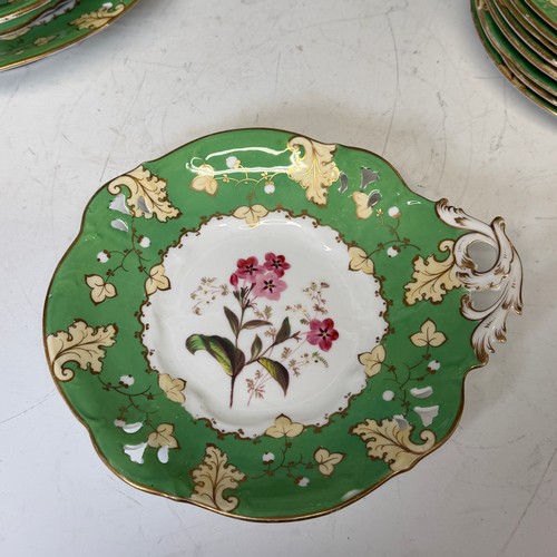 194 - A Staffordshire apple green dessert Service, with pierced, floral, and foliate decoration. (14)... 