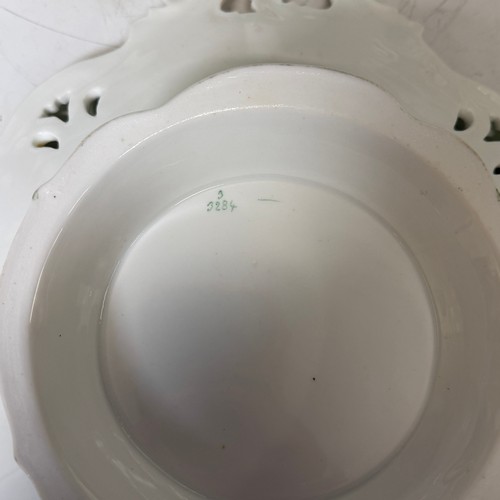 194 - A Staffordshire apple green dessert Service, with pierced, floral, and foliate decoration. (14)... 