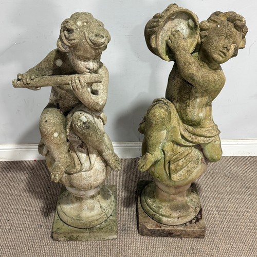 175 - A pair of reconstituted stone pair of Cherub Statues, one playing the tambourine and the other a pic... 
