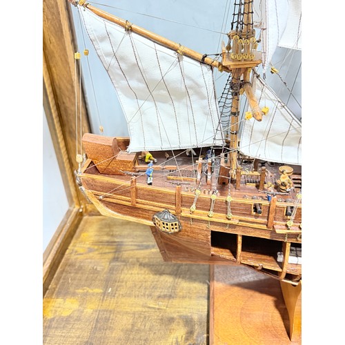 165 - A scratch-built model of the H.M.S Bounty, built by H.J Brabham, 2000, housed in an oak glazed Case,... 