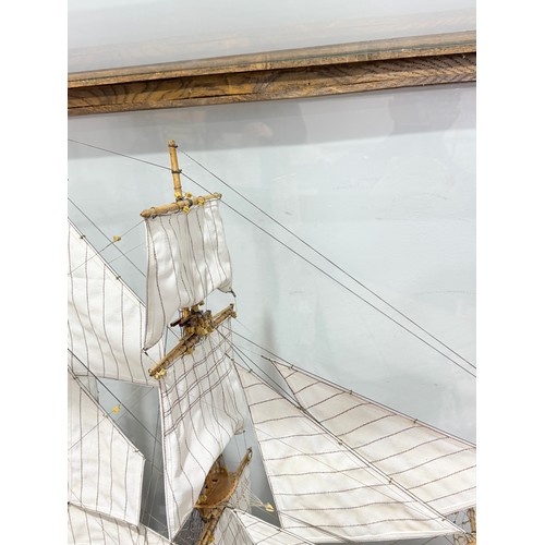 165 - A scratch-built model of the H.M.S Bounty, built by H.J Brabham, 2000, housed in an oak glazed Case,... 
