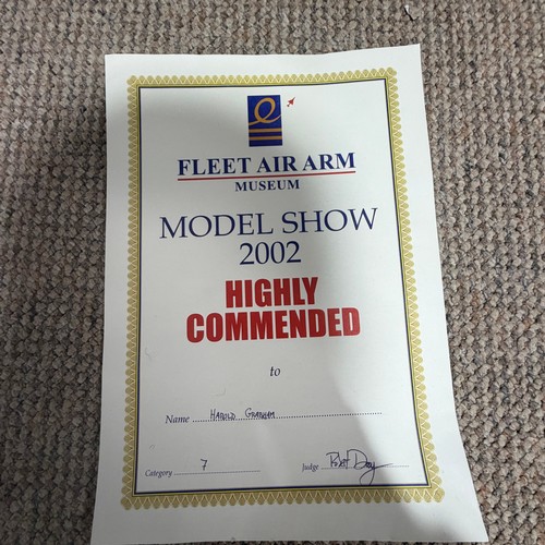 165 - A scratch-built model of the H.M.S Bounty, built by H.J Brabham, 2000, housed in an oak glazed Case,... 