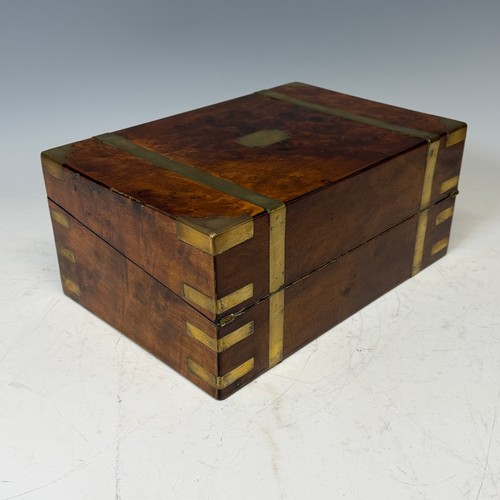 302 - A 19th century burr walnut and brass bound writing Slope, complete with fitted interior and black le... 