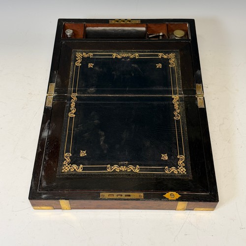 302 - A 19th century burr walnut and brass bound writing Slope, complete with fitted interior and black le... 