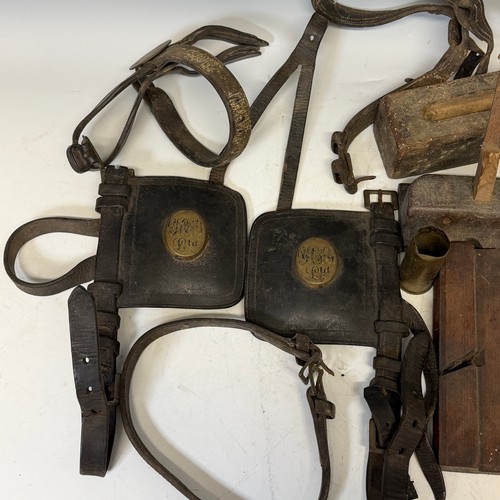 207 - A vintage pair of leather horse Blinkers, brass marked 'y.c&.y Ltd.', together with part related... 