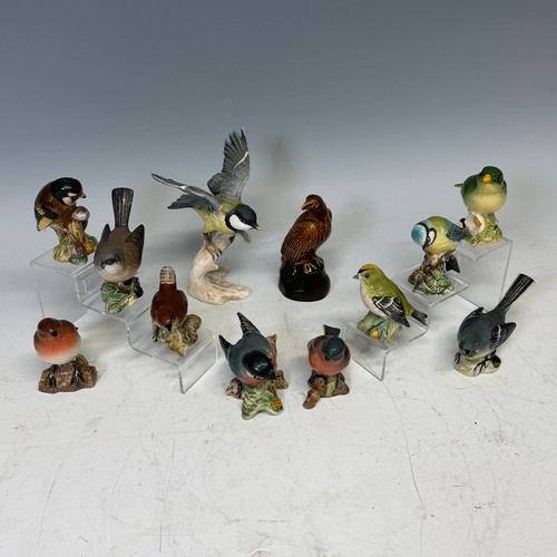 306 - A collection of ten Beswick Birds, including; blue tit '992', goldcrest '2415', goldfinch '2273', ro... 