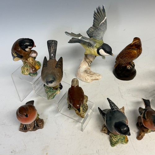 306 - A collection of ten Beswick Birds, including; blue tit '992', goldcrest '2415', goldfinch '2273', ro... 