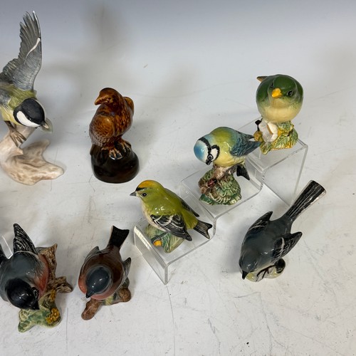 306 - A collection of ten Beswick Birds, including; blue tit '992', goldcrest '2415', goldfinch '2273', ro... 