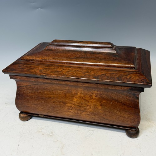 214 - A Victorian rosewood Tea Caddy, with two lidded compartments, raised on bun supports, W 41 cm x H 27... 