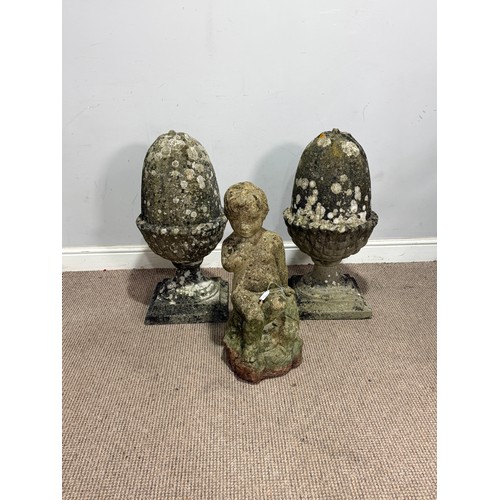 106 - A pair of weathered reconstituted stone pier Acorns, W 32 cm x H 65 cm x D 32 cm, together with a re... 