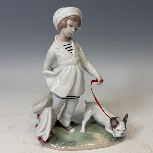 231 - A Lladro figure 'Girl with French bulldog', with original box, certificate, and receipt of purchase,... 