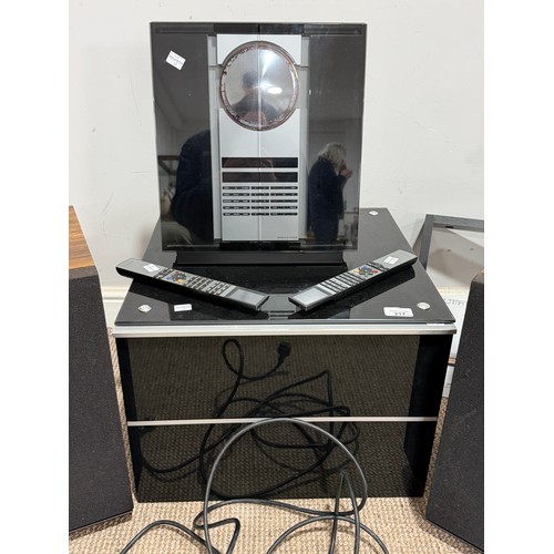 217 - A Bang & Olufsen Beosound 3200, W 31 cm x H 37 cm x D 12 cm, with a small black Cabinet and a qu... 