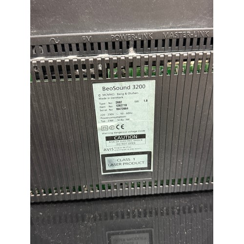 217 - A Bang & Olufsen Beosound 3200, W 31 cm x H 37 cm x D 12 cm, with a small black Cabinet and a qu... 