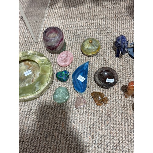 266 - A large malachite bowl, together with a lapis lazuli carved elephant, green onyx ashtray and assorte... 