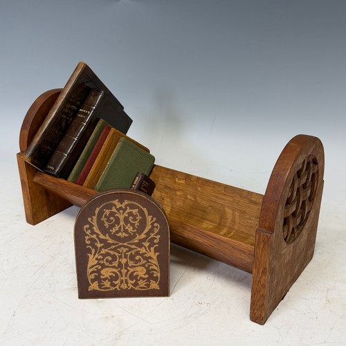 221 - An Arts & Crafts oak book Trough, W 40 cm x H 20 cm x D 16 cm, together with seven pocket Books ... 