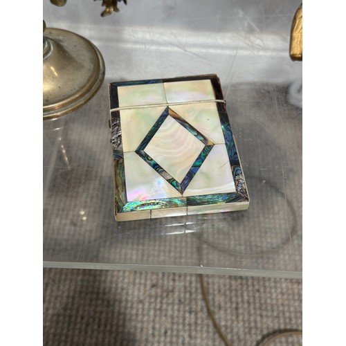 267 - A carved coquilla nut pocket pomander, together with brass candlesticks and easels, glass chandelier... 