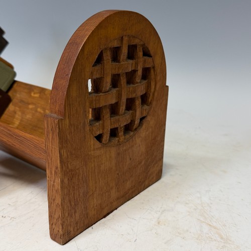 221 - An Arts & Crafts oak book Trough, W 40 cm x H 20 cm x D 16 cm, together with seven pocket Books ... 
