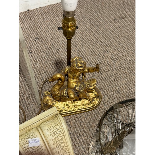 267 - A carved coquilla nut pocket pomander, together with brass candlesticks and easels, glass chandelier... 