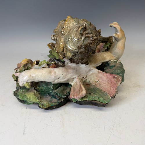 272 - A large 19th century Maiolica figure of a Putto, centrepiece converted to a wall hanging, probably I... 