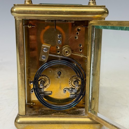 163 - A 19th century gilt brass cased carriage Clock, with repeat and striking on gong, backplate stamped ... 