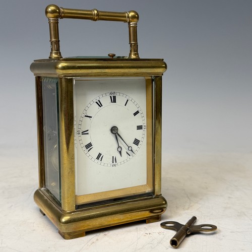 163 - A 19th century gilt brass cased carriage Clock, with repeat and striking on gong, backplate stamped ... 